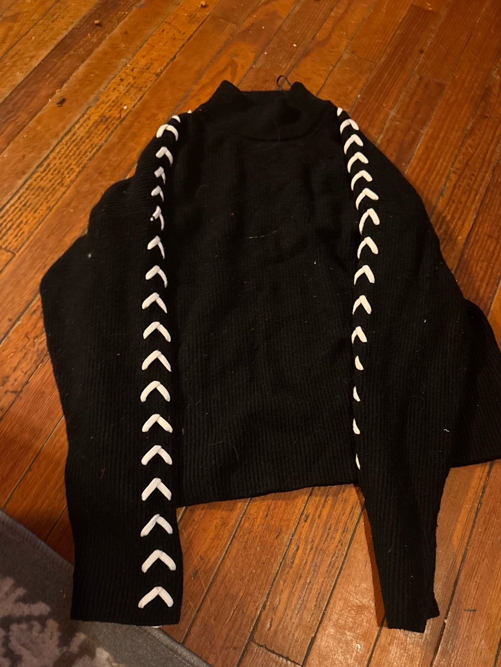 Black Sweater with White Lace-Detail Sleeves